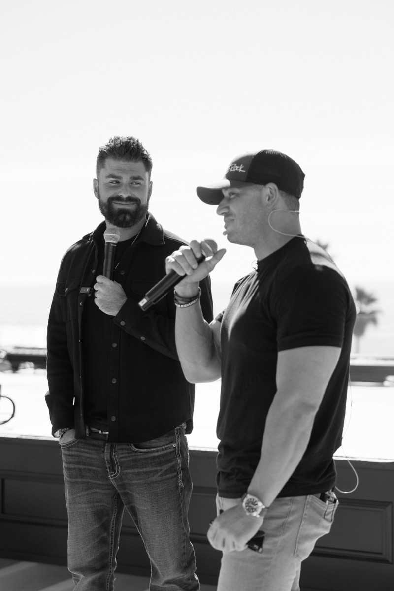 Caleb speaking at an event